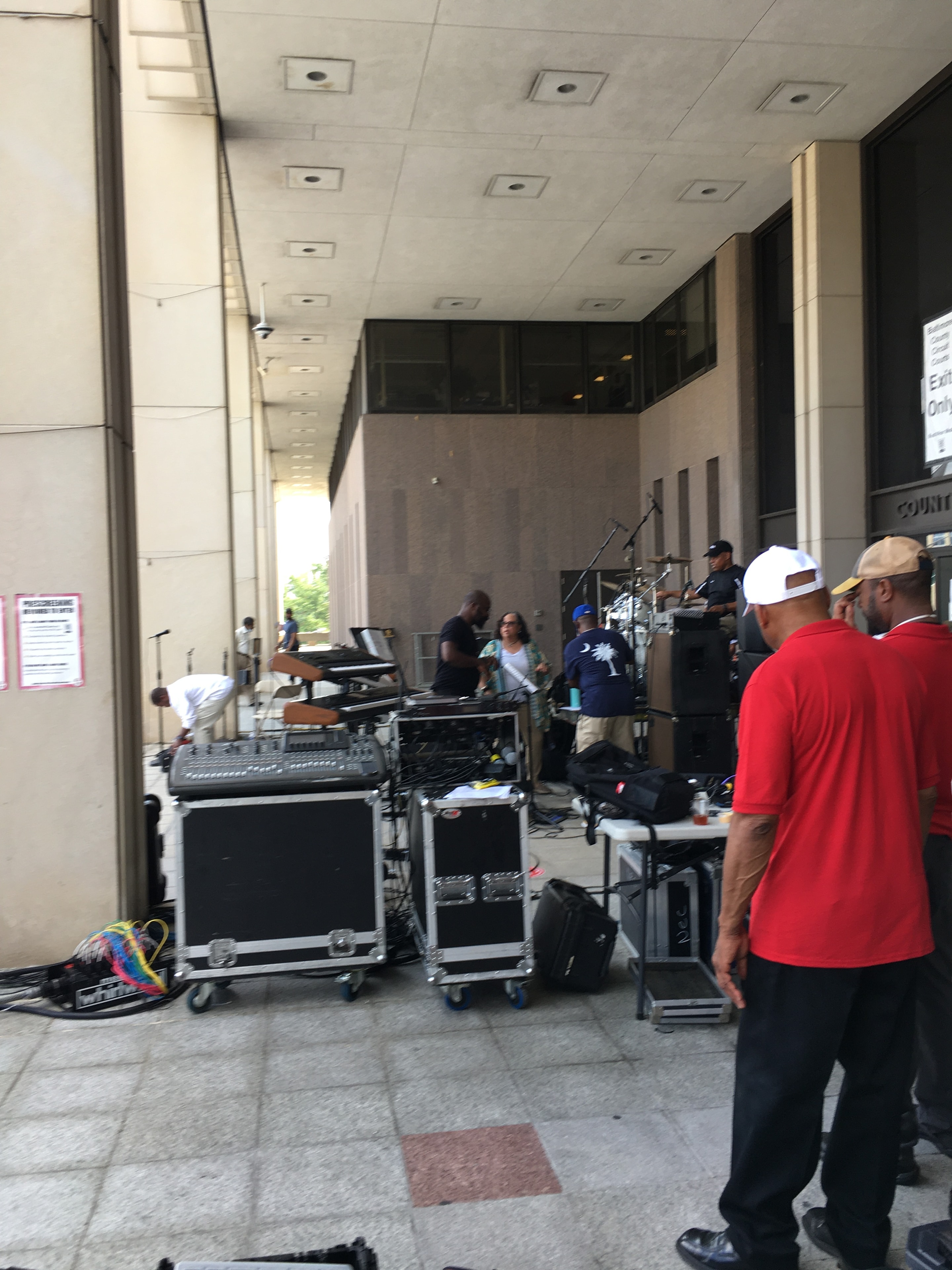 Production crew and equipment setup outdoors